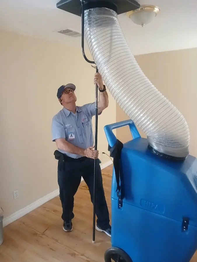 Mini Split Installation technician using HEPA equipment in Blue Springs